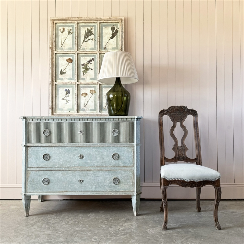 Chest of drawers and flower print